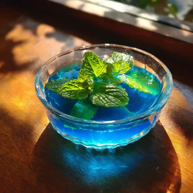 Cozy living room scene with person holding blue gelatin and ingredients nearby